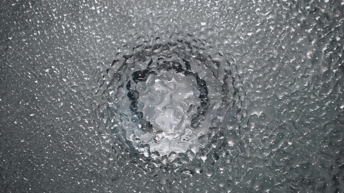 Textura de gotas de agua sobre una superficie de cristal